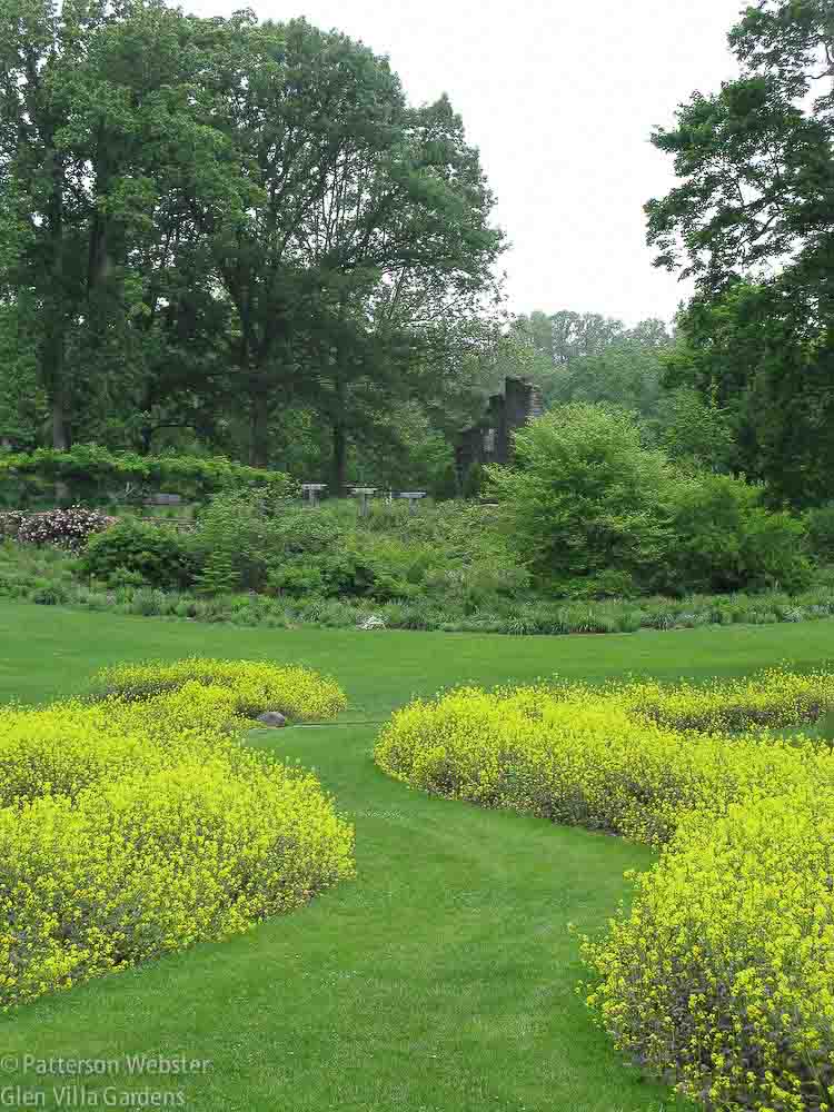 The plants used to edge this curving path at Chanticleer change annually. 