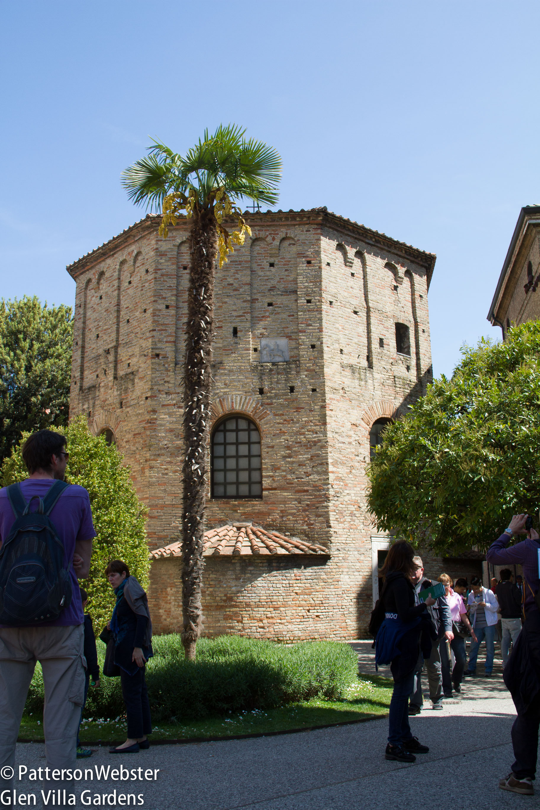 The exterior of the Neonian Baptistry is a simple octagonal brick construction. 