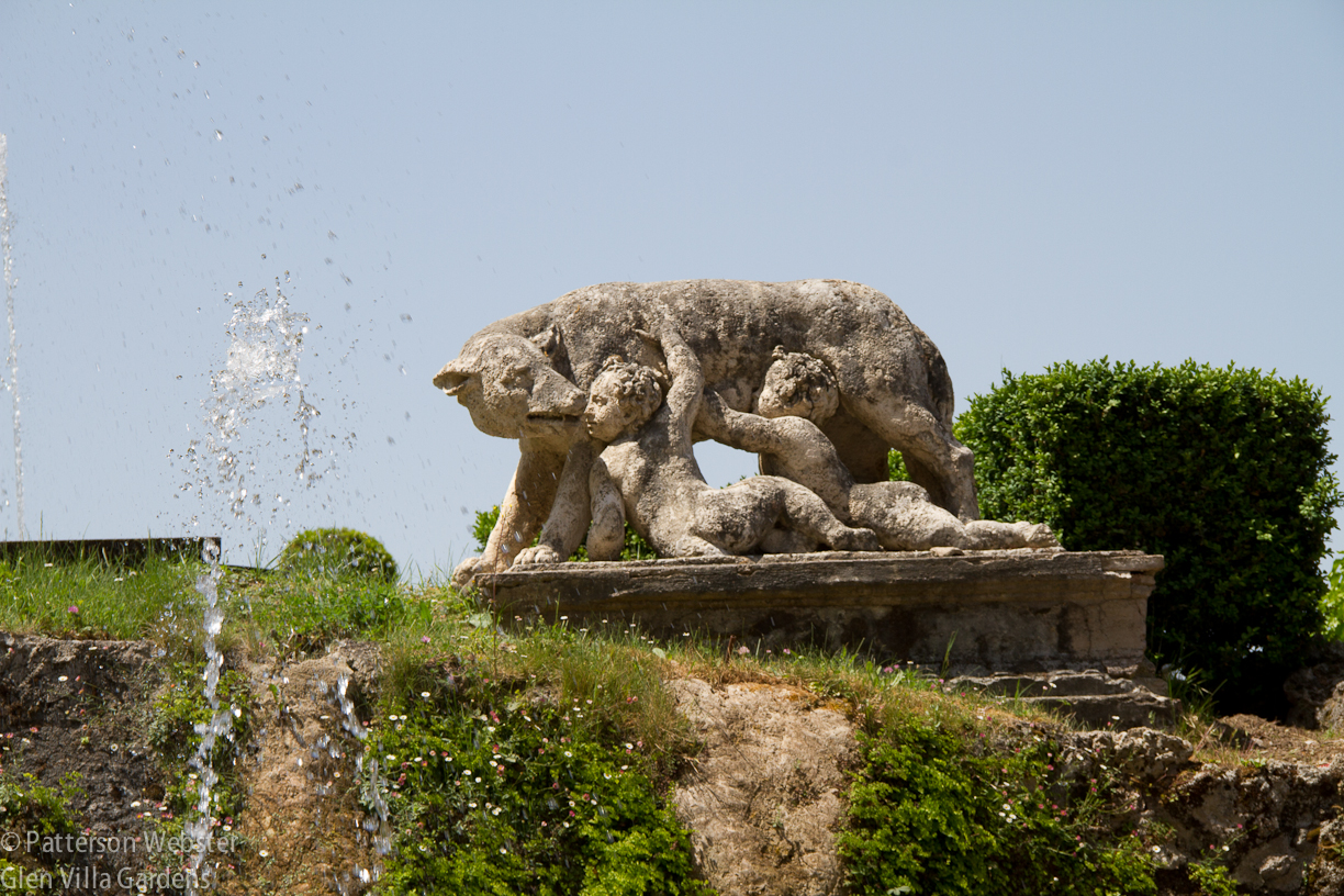 This statue of Romulus and Remus with the She-Wolf is in the slightly Disney-like Rometta, a miniature representation of some of Rome's landmarks. It stands at one end of a cross axis. At the other end is the Oval Fountain, where Tivoli the Allée of a Hundred Fountains,