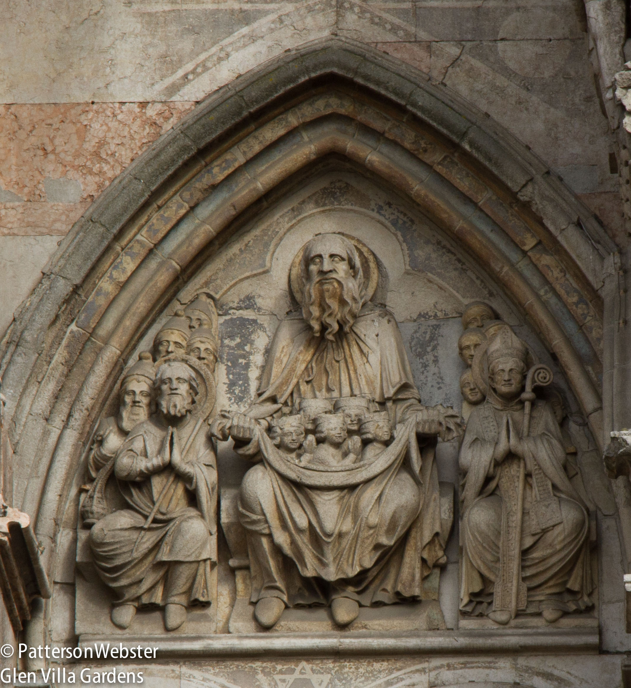 The carving shows details of clothing and hair styles.