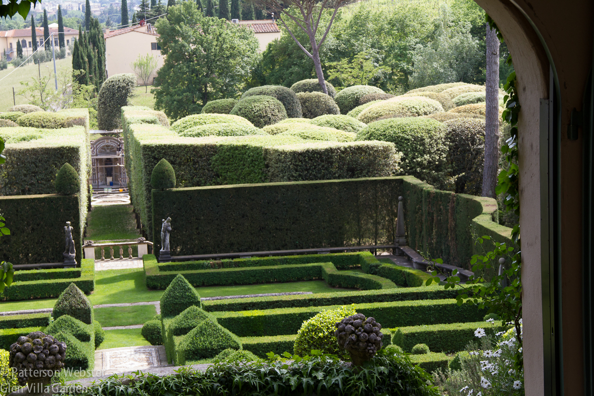 From the top terrace of the Italian garden, it is possible to see the rounded tops of the trees in the bosco, pruned to resemble billowy clouds.