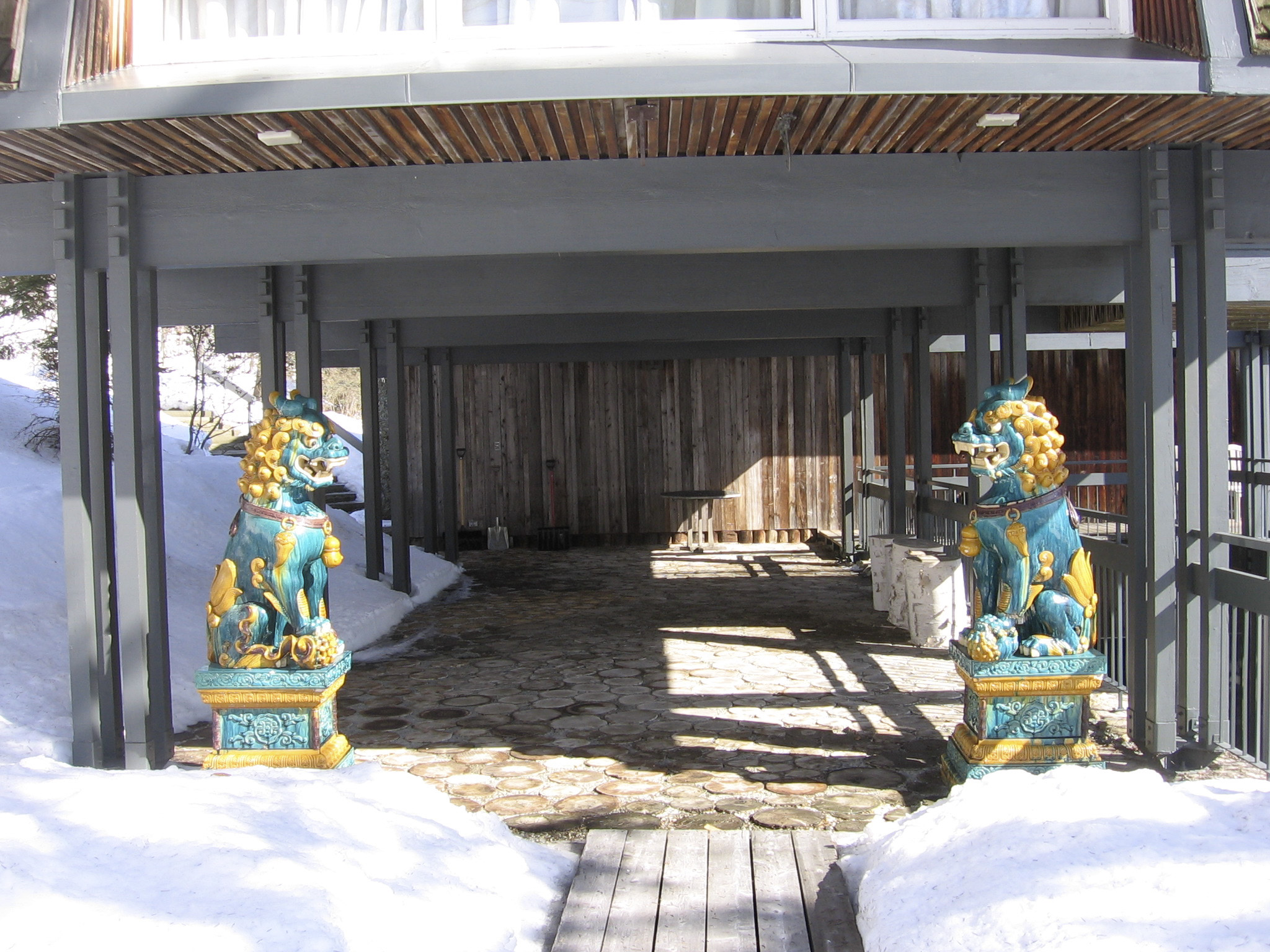 The Log Terrace is guarded by a pair of Chinese lion dogs we acquired when we lived in China, a long long time ago.