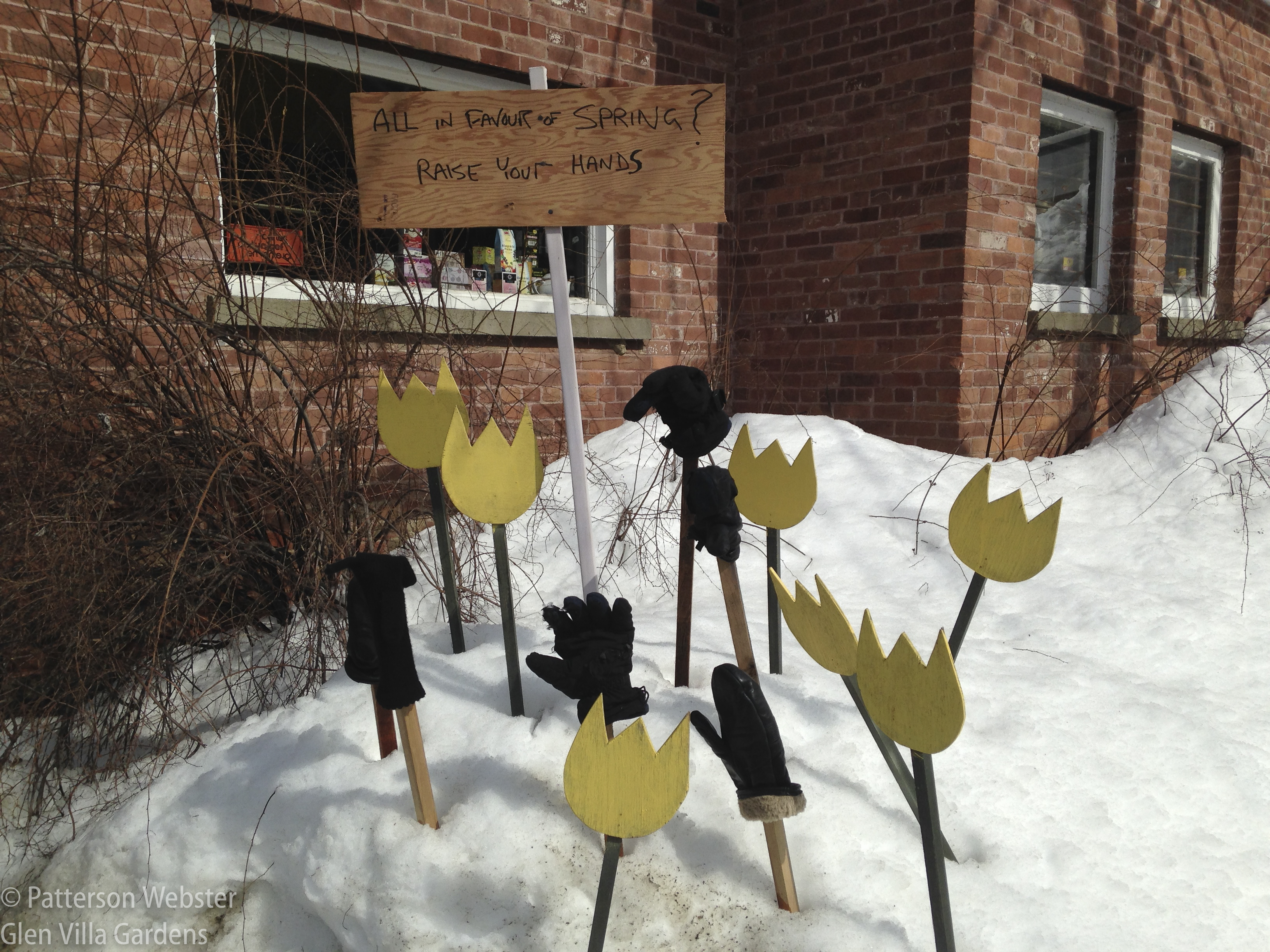 Gloves lost over the winter are there for the taking. I'd rather take the tulips, even if they are made of wood.