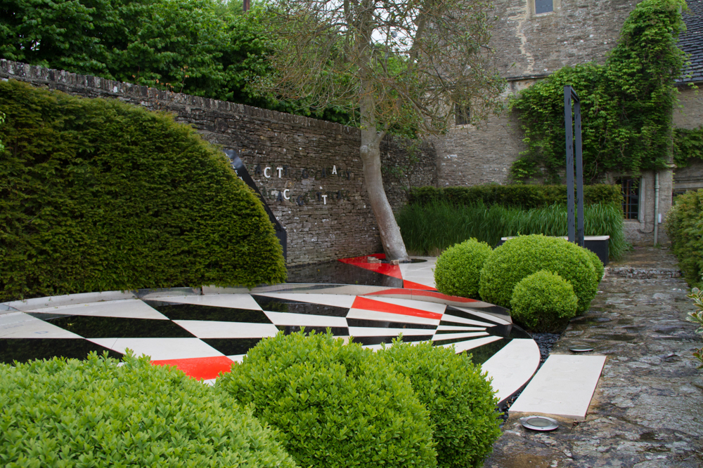 This terrace of black, white and red at Througham Court in Oxfordshire sits uneasily beside an Arts and Crafts garden and a house built centuries ago. It provoked much discussion. It is certainly unusual. You can read my 2014 review of this garden at ThinkinGardens.com 