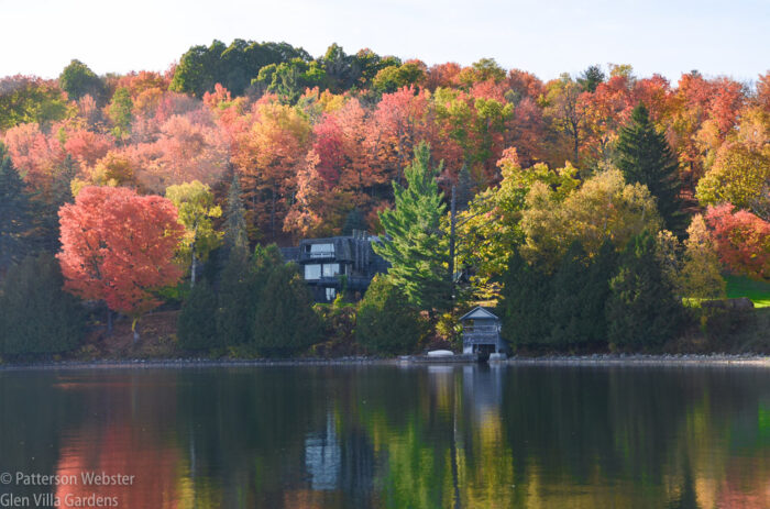 Our house and boathouse are dwarfed by the hills that rise behind. Our house and boathouse are dwarfed by the hills that rise behind.