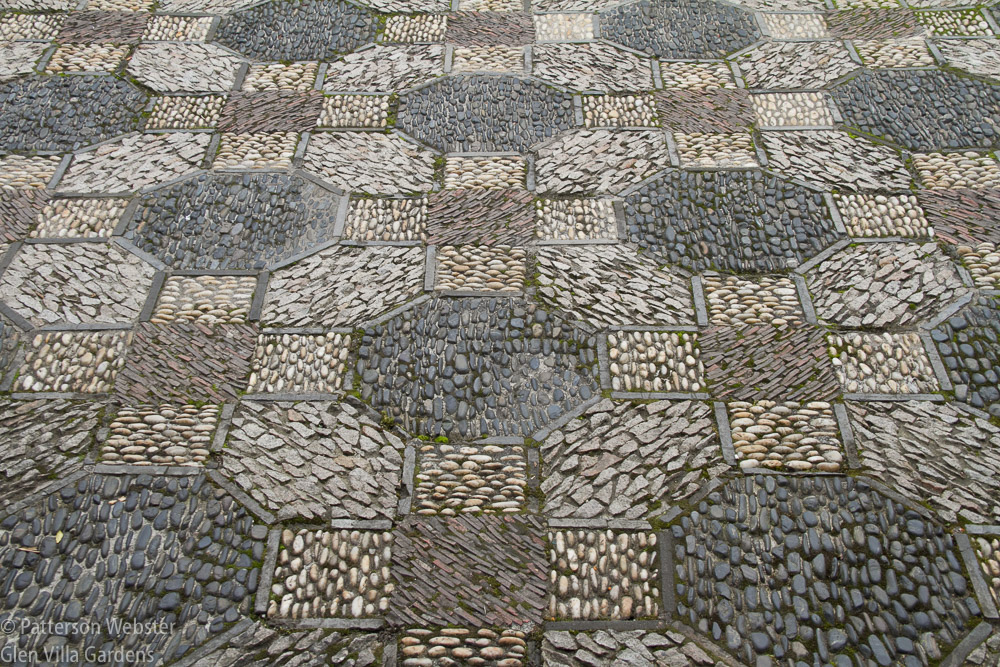 This pavement pattern in the male part of the garden is composed of straight lines, thought to be more representative of male characteristics.