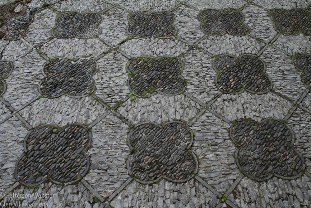 Black and white are highlighted in this paving pattern. Black is the female element, white is the male. 