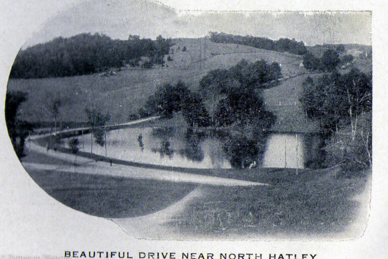 The road separates two parts of the so-called trout pond. The pond was the first obstacle of a 9-hole golf course that was part of Glen Villa Inn.