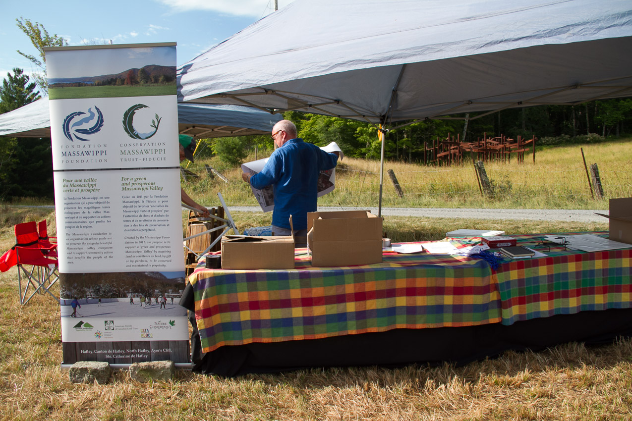 A volunteer sets up the registration table at last year's Open Garden Day.