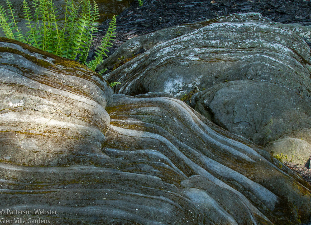Striations in the rock suggest ripples in a stream. 