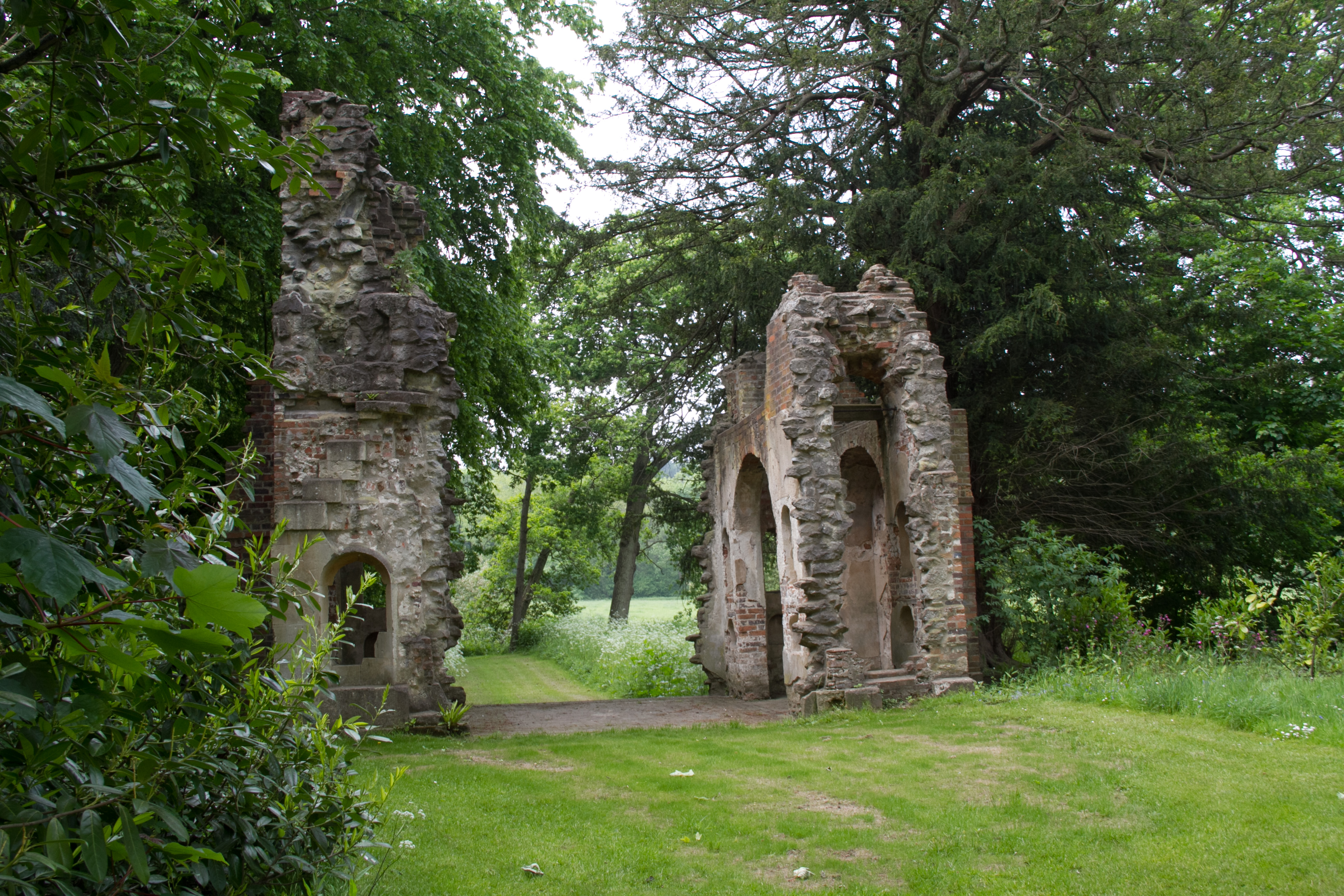 A triumphal arch, Roman style, was part of the landscape at Painshill, an early 18th century garden in England. 