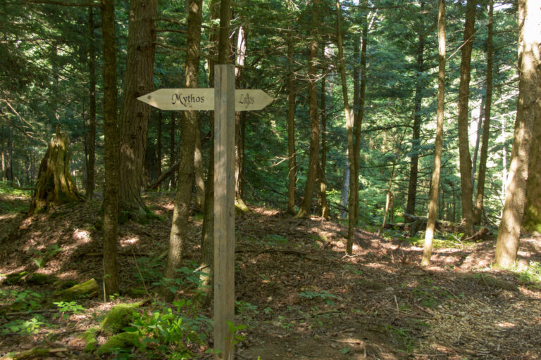 Many people walking the trail ignored the sign pointing to Mythos and continued along the main trail. Many people walking the trail ignored the sign pointing to Mythos and continued along the main trail.
